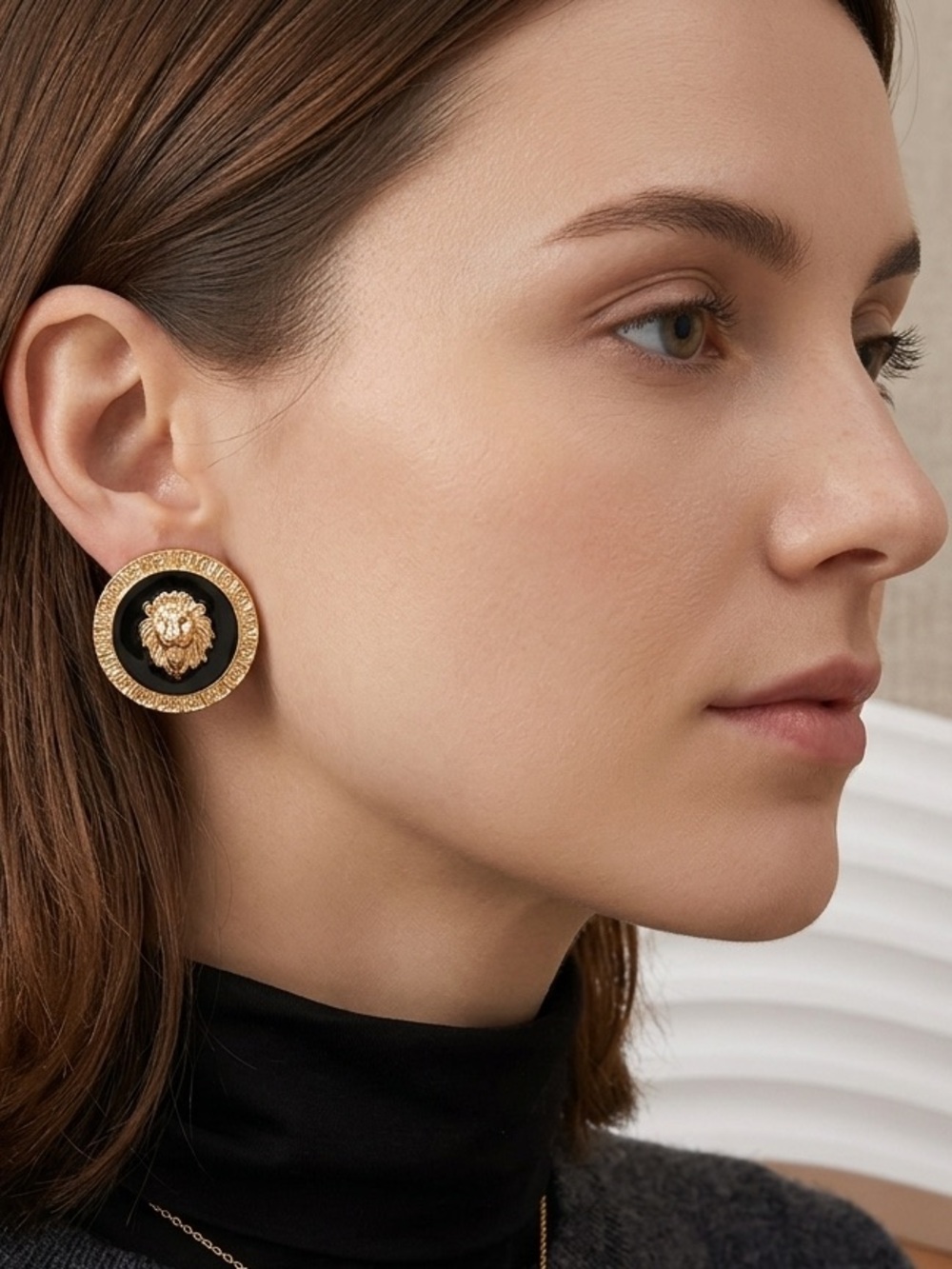 Striking Golden Lion Head Studs with Sleek Black Enamel